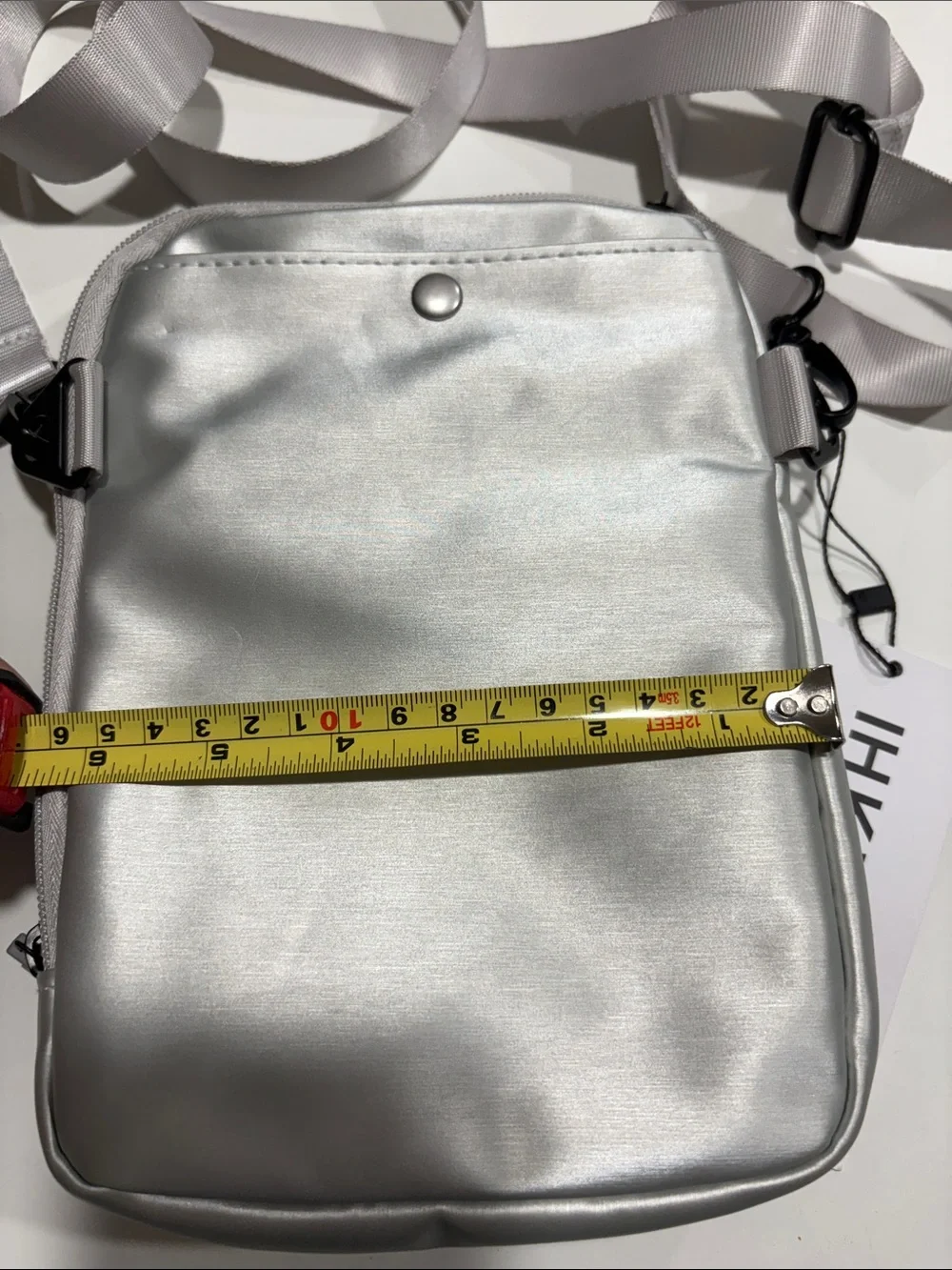 Ikwhip Metallic Matte Silver Everyday Crossbody Bag. Lots of pockets! Web strap